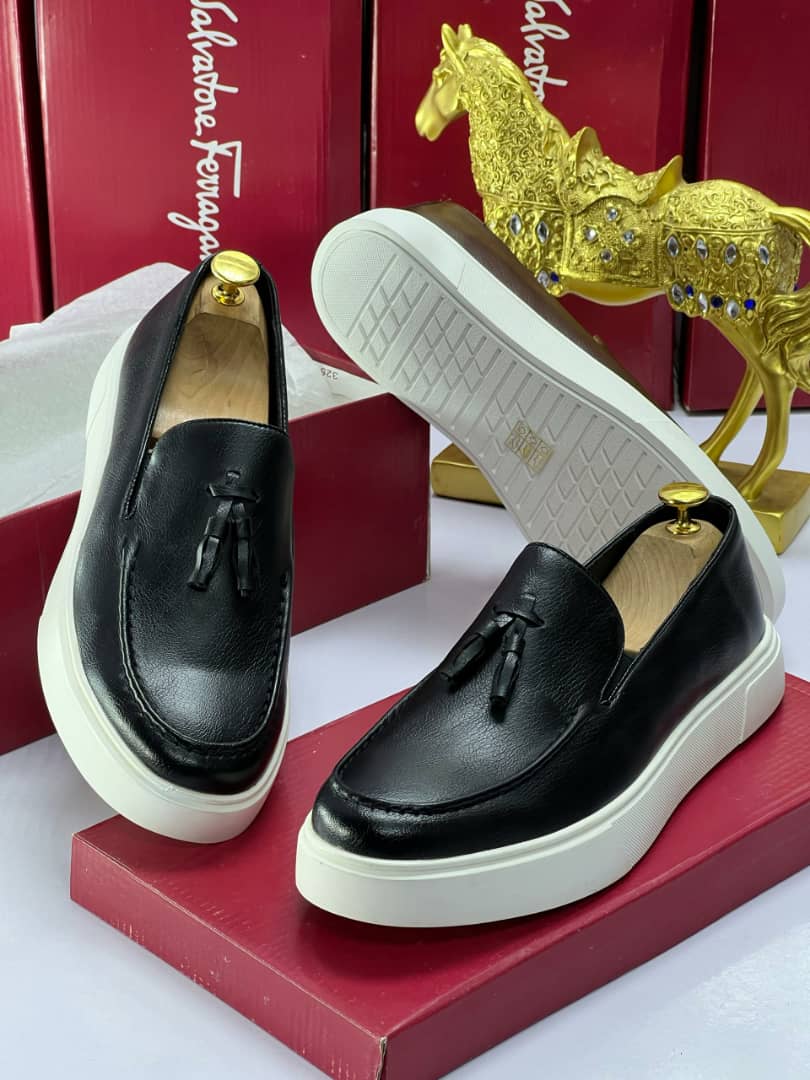 Salvatore Ferragamo Black Leather Tassel Loafers – White Sole Slip-On for Men